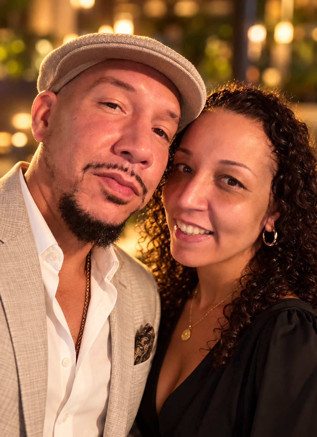 Cesar and Jennifer Gallardo, a warm portrait at night.