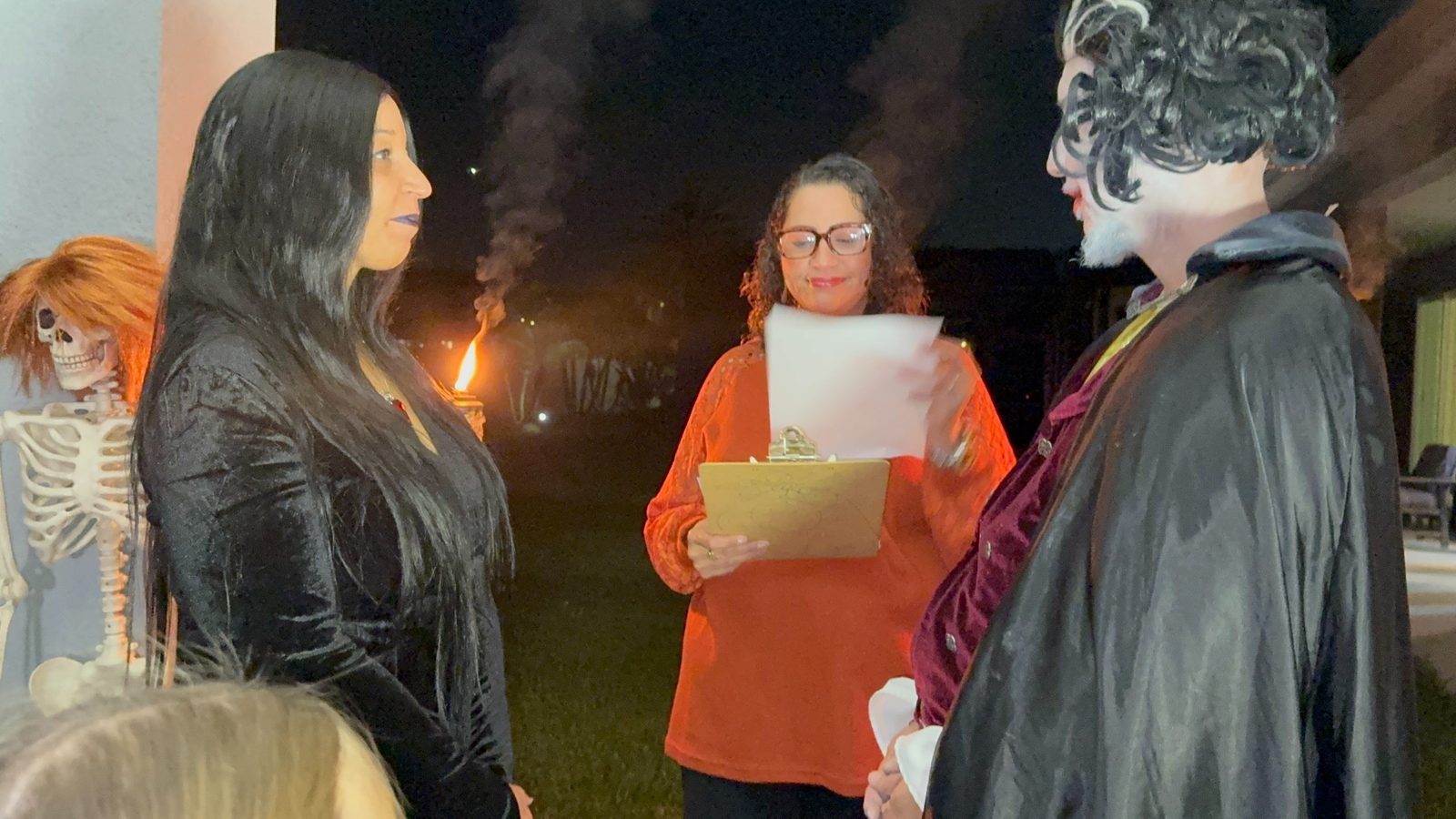 A costumed Halloween-themed 13 I DO'S ceremony