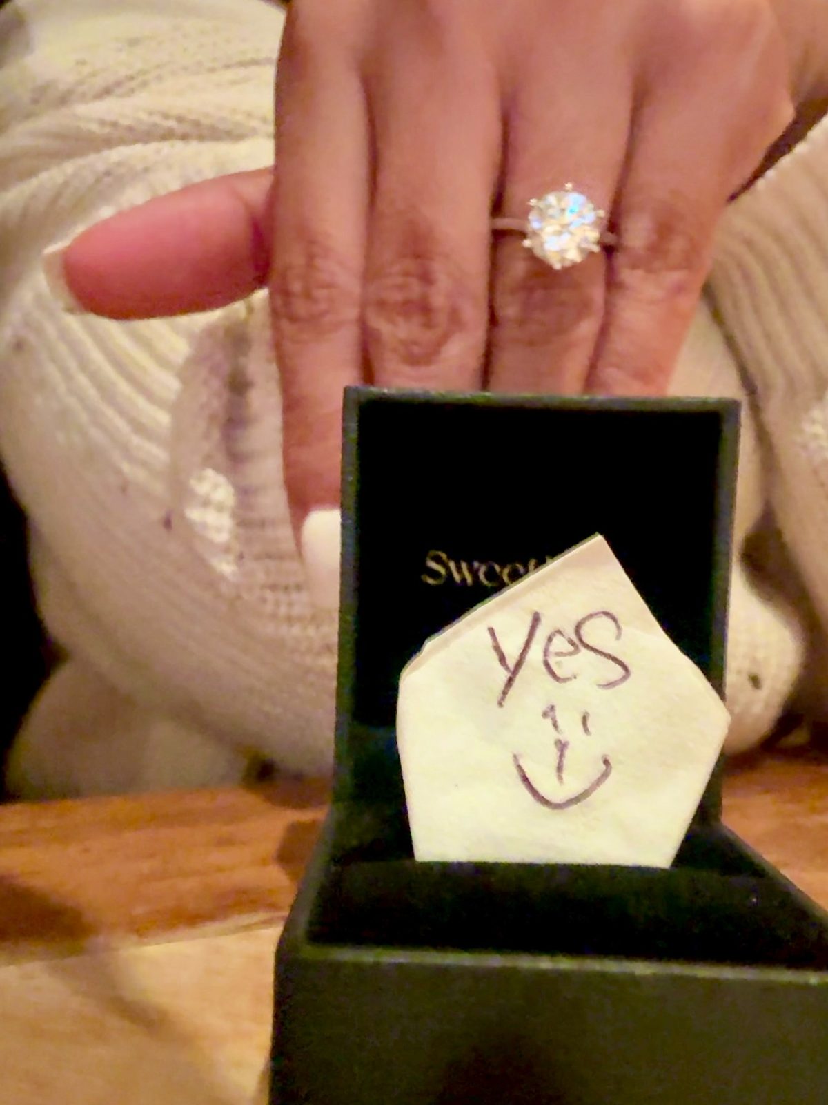 Close view of the handwritten 'Yes' note
